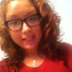 A girl wearing glasses invites us into her bathroom while she takes a shit on a toilet. Farting, crackling, and plop sounds can be heard while she provides great facial expressions when pushing it all out!